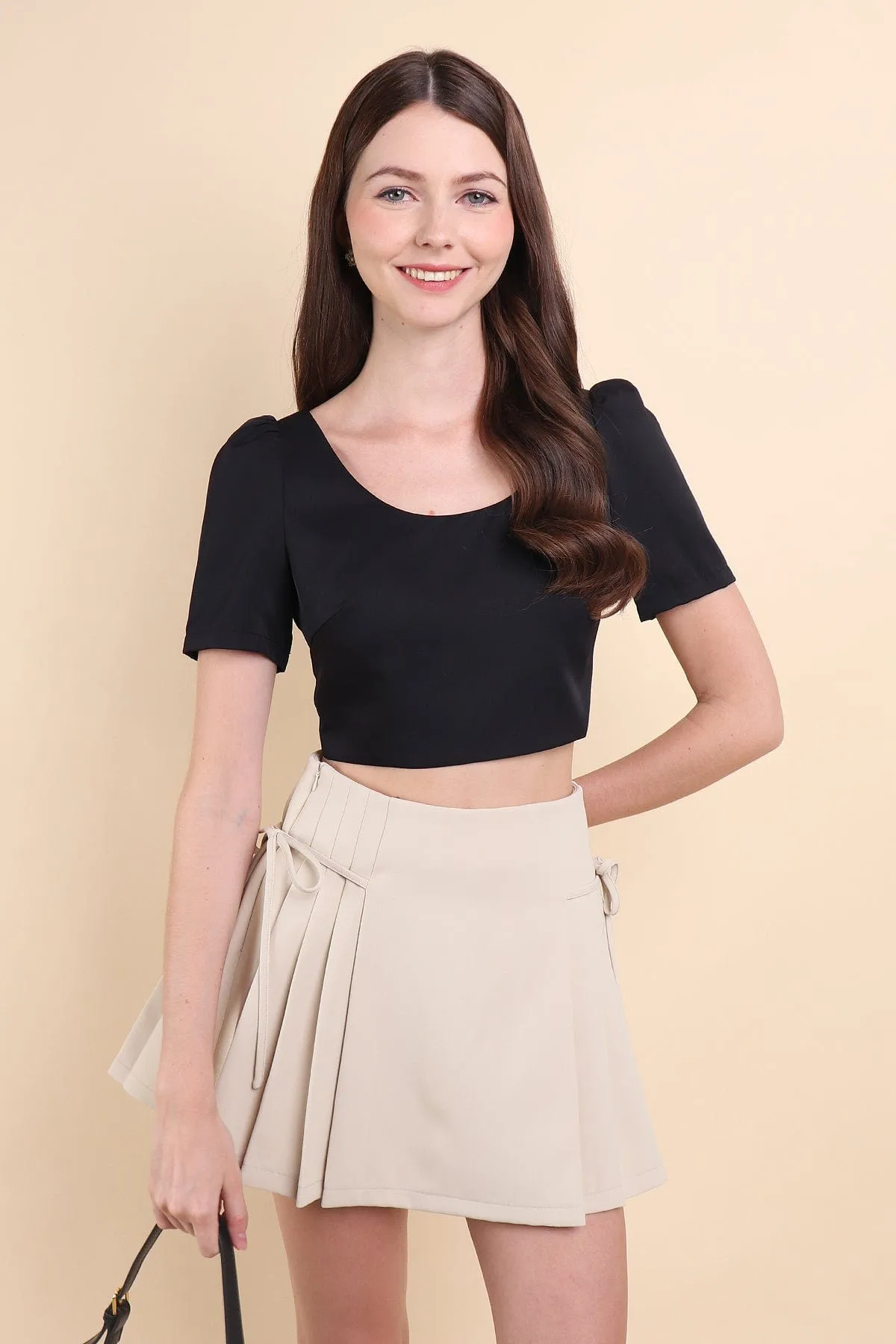 BEBE PADDED BOW OPEN BACK TOP IN BLACK