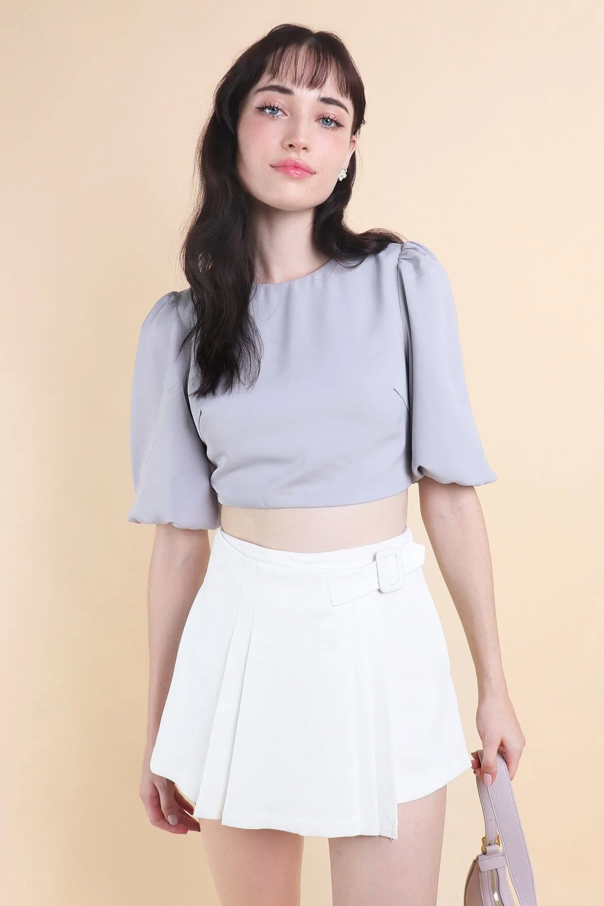 CREST PADDED TIE-BACK SLEEVE TOP IN PERI BLUE
